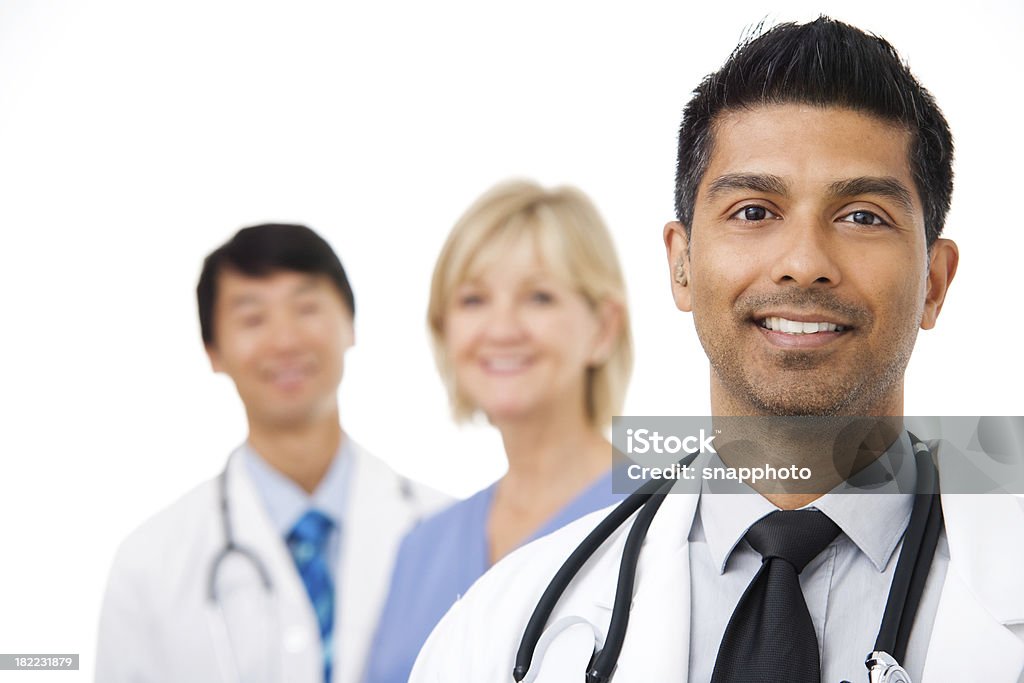 Young Doctor with medical team Yount doctor looking at the camera. Doctor Stock Photo