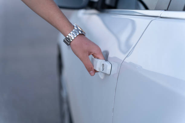 istock The hand that opens the car door. 1822321236