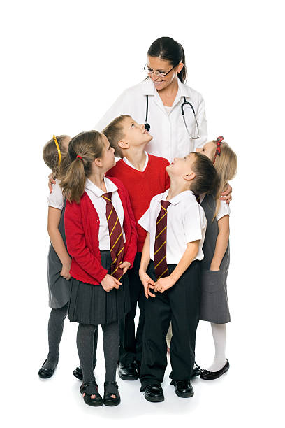 istock Doctor With School Kids, Studio Portrait 182232126