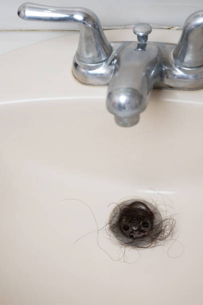 istock Cleaning sink plumbing hole 1822322953