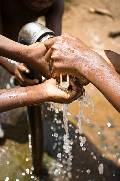 istock African Children's Hands Under Running Water 182232327