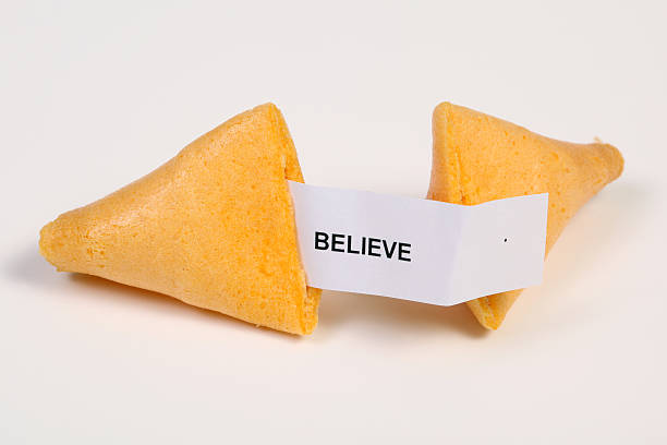 opinião - believe aspirations forecasting fortune cookie - fotografias e filmes do acervo