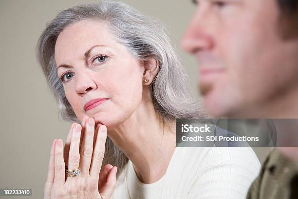 Serious Ceo In A Meeting With Hands To Her Chin Stock Photo - Download Image Now - 60-69 Years, Active Seniors, Adult