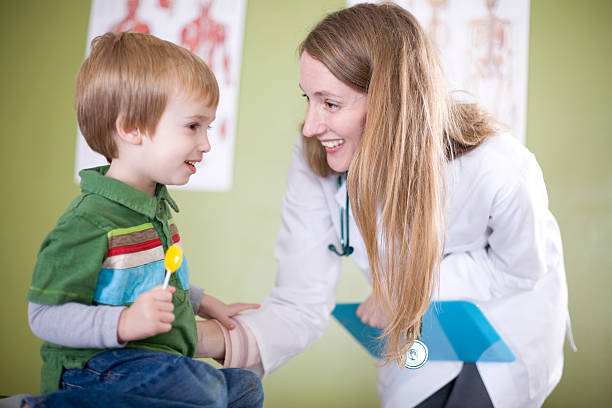 istock Peditrician and child 182233467