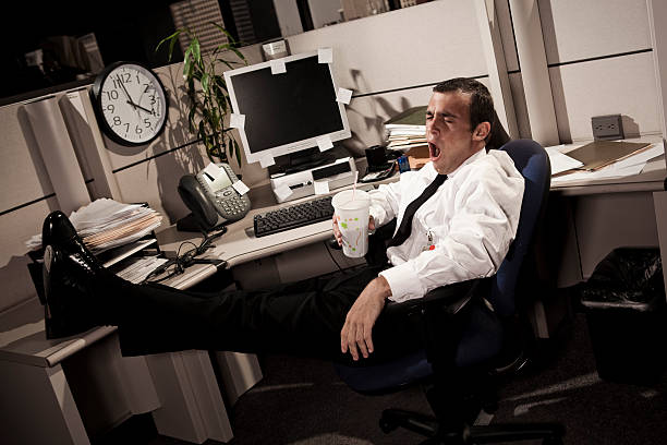 istock Tired Business Man in Office Cubicle 182234445