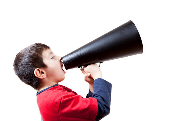 istock Little Boy Shouting On Old Fashioned Megaphone 182234618