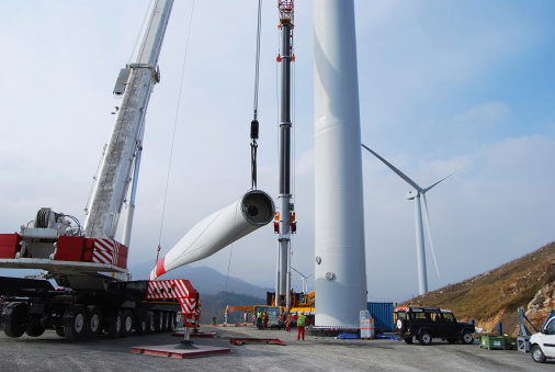 Wind power plant construction with blade ready for assembly