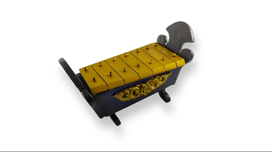 Miniature Indonesian Javanese Traditional Gamelan Music Instruments in White Isolated Background