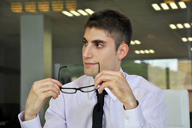 istock businessman sitting in his office 182235620