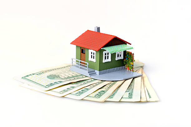 Your home on top of Money stock photo