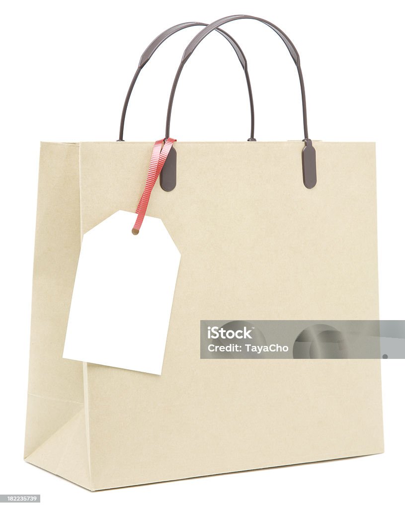 Marrone carta vuota shopping bag con etichetta - Foto stock royalty-free di Borsa