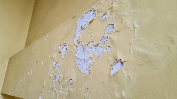 istock Texture of wall with peeling paint and cracks, abstract background 1822362695