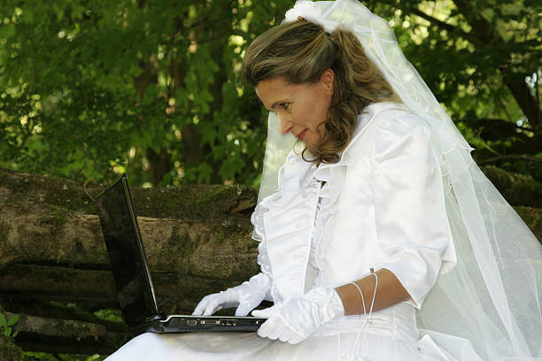 istock working in wedding dress 182236394