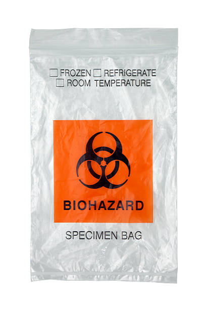 Biohazard Specimen Bag "Biohazard specimen bag isolated on white, with clipping path.Please also see:" evidence bag stock pictures, royalty-free photos & images