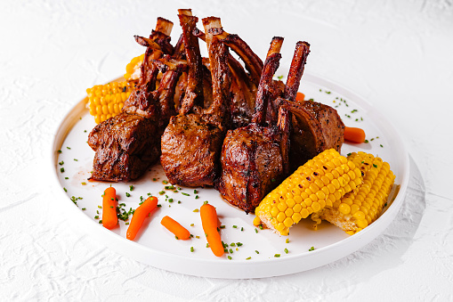 rack of lamb with corn and carrots