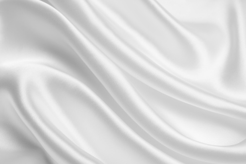 White satin background.  YOU MIGHT ALSO LIKE: