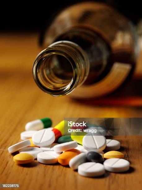 Tablets And Alcohol Suicide Stock Photo - Download Image Now - Alcohol - Drink, Medicine, Pill