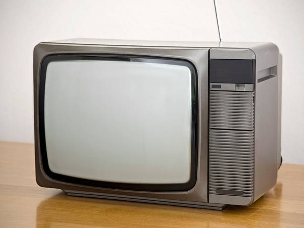 istock Small sized retro color TV on oak table (early 80's) 182238187