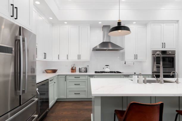 istock A kitchen detail with white and sage green cabinets. 1822384847