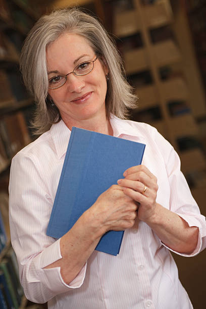 istock Woman in Library Series 182239179