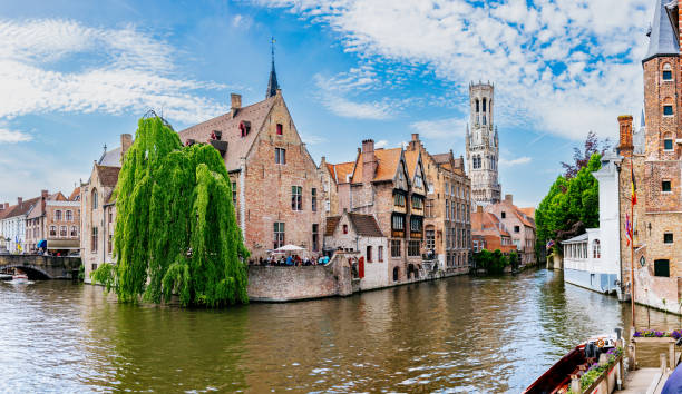 istock Bruges Canal with Belfry Tower in the Background. 1822405601