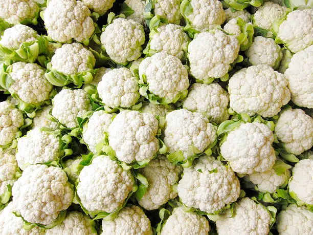 Bin of Cauliflower Heads.