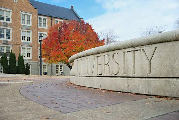 Photo of University sign in fall