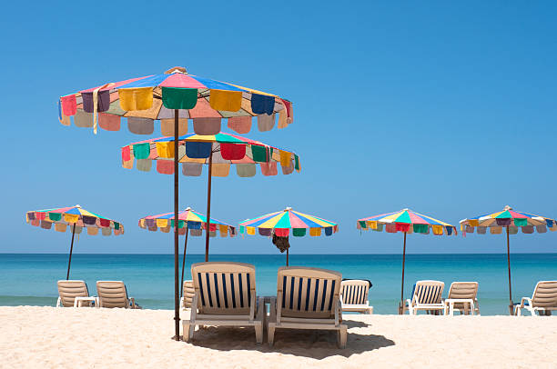 istock Sun Loungers On A Tropical Beach In Phuket, Thailand 182241180