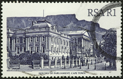 The politicians of the Volksraad at the Ou Raadsaal in Pretoria, South Africa. Vintage photo etching circa 19th century. At this time it was the home of the Volksraad (People’s Council).
