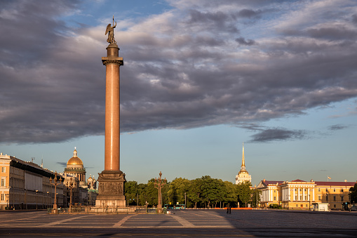 Alexander Column on Palace Square with a view of St. Isaac's Cathedral and the Admiralty in St. Petersburg, Russia