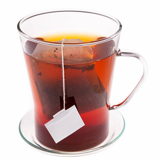 istock Glass of tea isolated on white 182242024