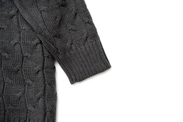 istock Gray knitted sweater, close-up isolated on white background 1822421870