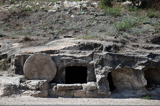 Landscape of Christ's empty stone tune This empty tomb is possibly the tomb that Jesus Christ once used. tomb photos stock pictures, royalty-free photos & images