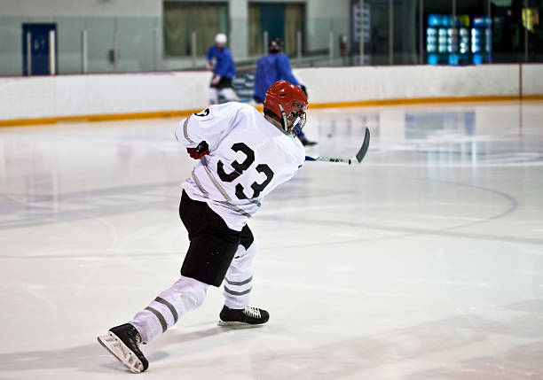 istock Ice hockey game action shot 182242698