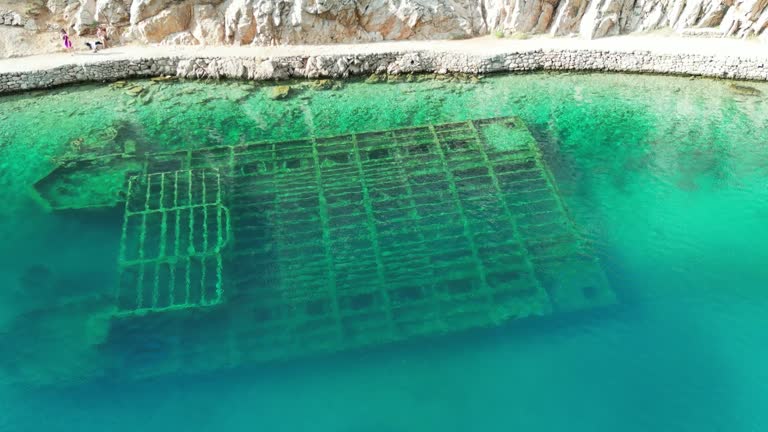 Drone shot of an abandoned German Wehrmacht shipwreck from the WWII in Zavratnica inlet, Croatia