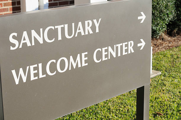 istock Sanctuary and welcome center sign 182243857