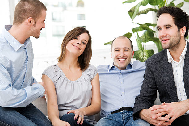 istock Four Friends Hanging Out on a Sofa at Home 182243987
