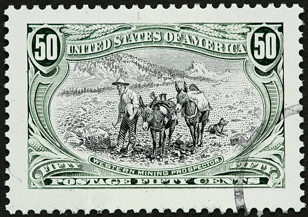istock old time prospector with burros 182246218