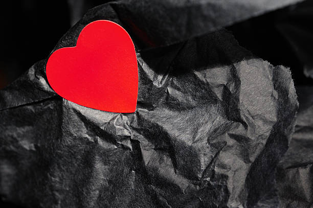 istock Red Valentine Heart on Black 182247495