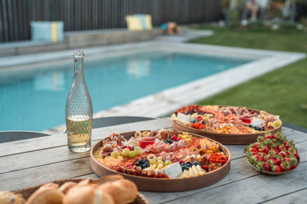 istock Lovey Cold Cut Platter and Champagne by the Pool 1822476198