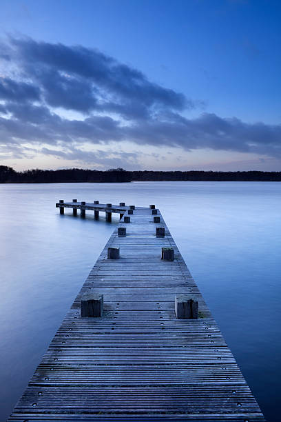 istock Jetty on lake at dusk in Amsterdamse Bos, The Netherlands 182247784
