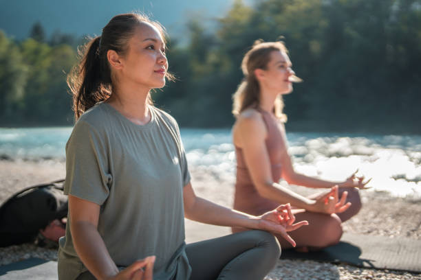 istock Yoga Session with Diverse Women by the River 1822479695