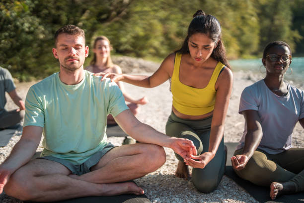 istock Diverse Yoga Gathering by the River 1822479700