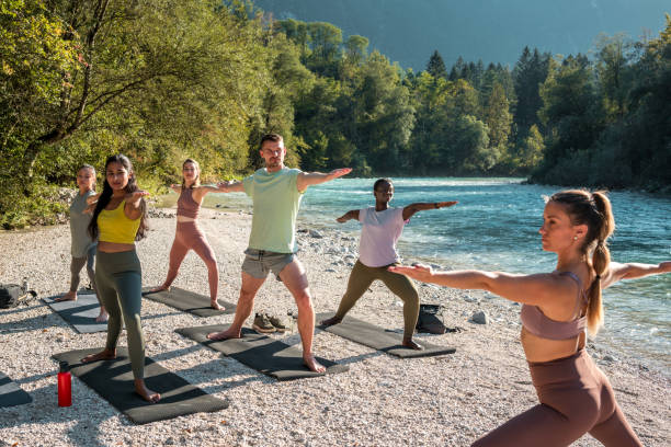 istock Sunlit Diverse Yoga Warriors 1822480272