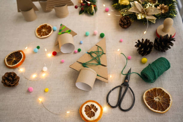 istock A creative handmade little Christmas tree of cardboard. eco-friendly and zero waste concept 1822487536