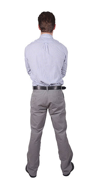 istock Isolated young adult male facing back 182249251