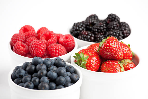 istock Different fruits - strawberries, blueberries, raspberries and blackberries 182249382
