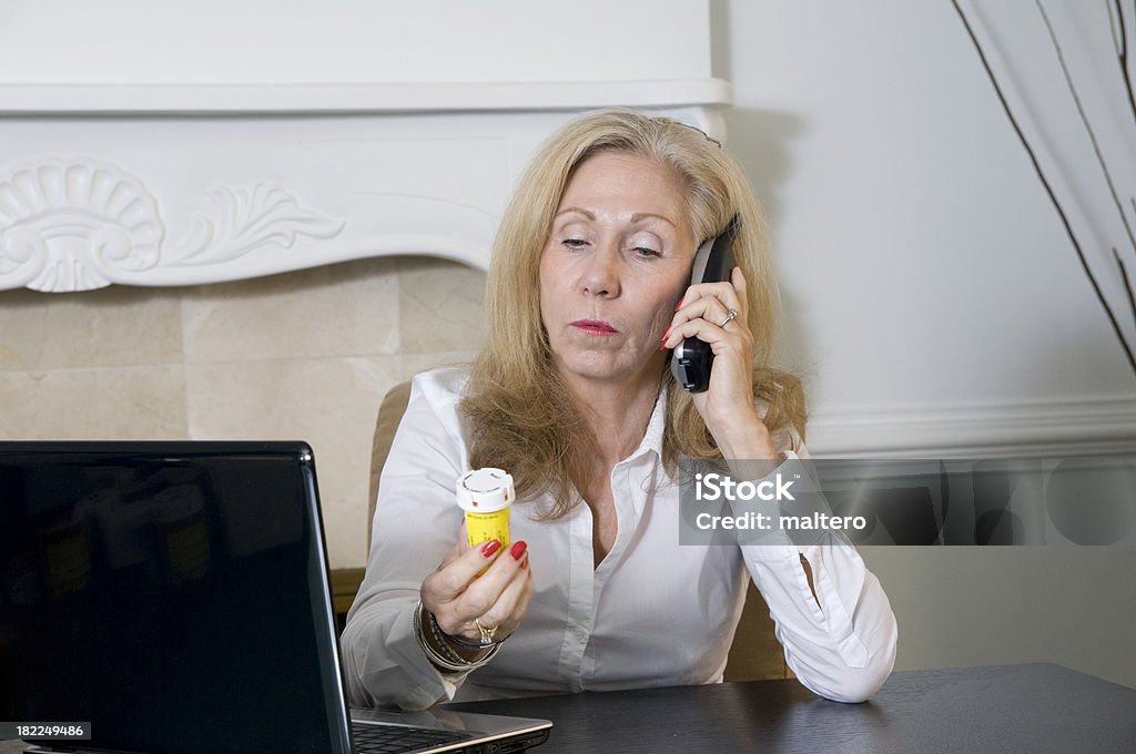 Woman seeking information about prescrition medicine. Adult Stock Photo
