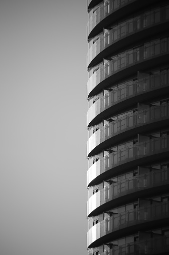 rows of balconies of an apartment skyscraper