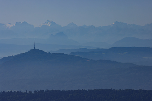 aerial view of famous Uetliberg in Zurich, swiss alps in background